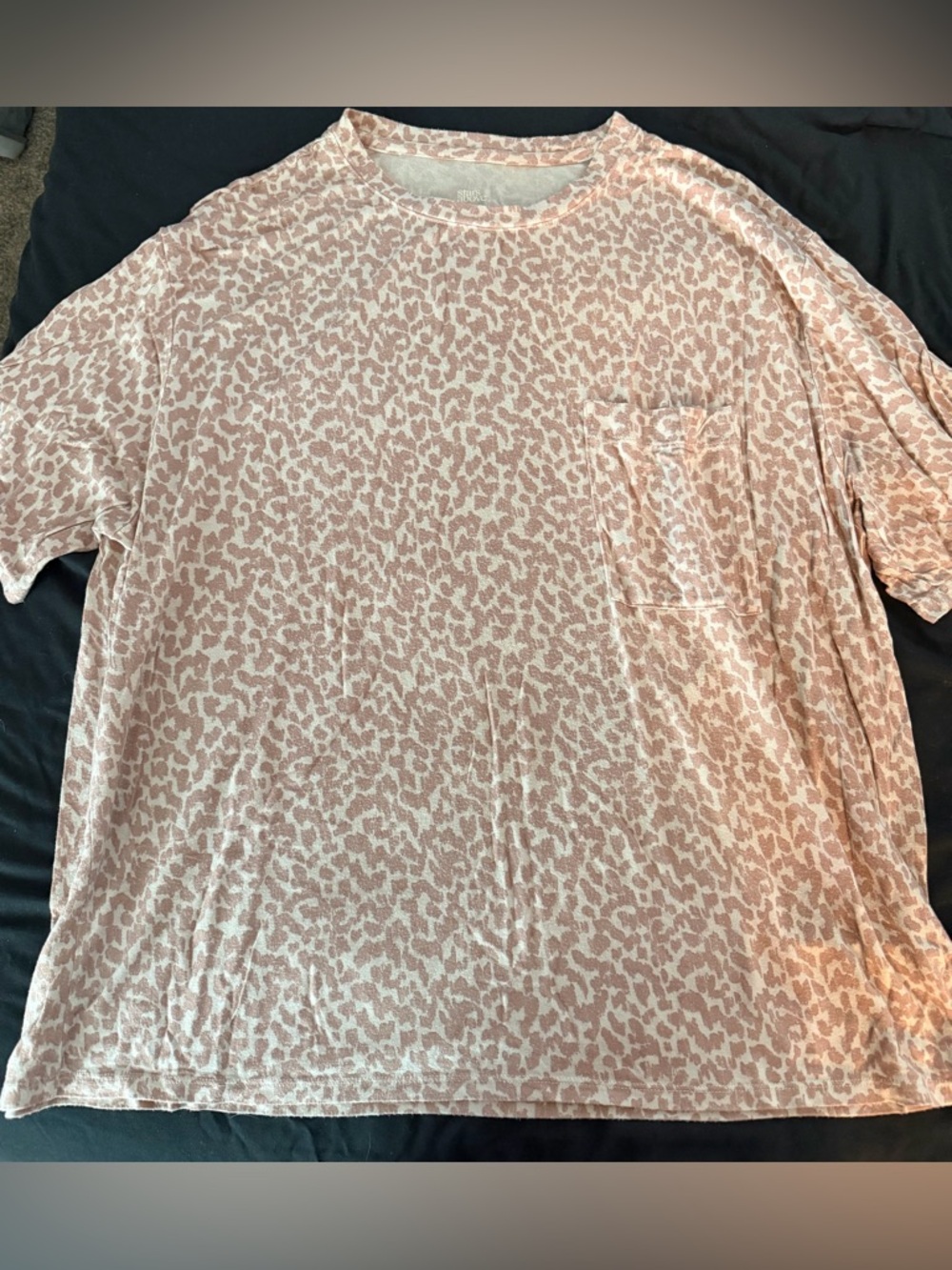 Stars above pocket tee